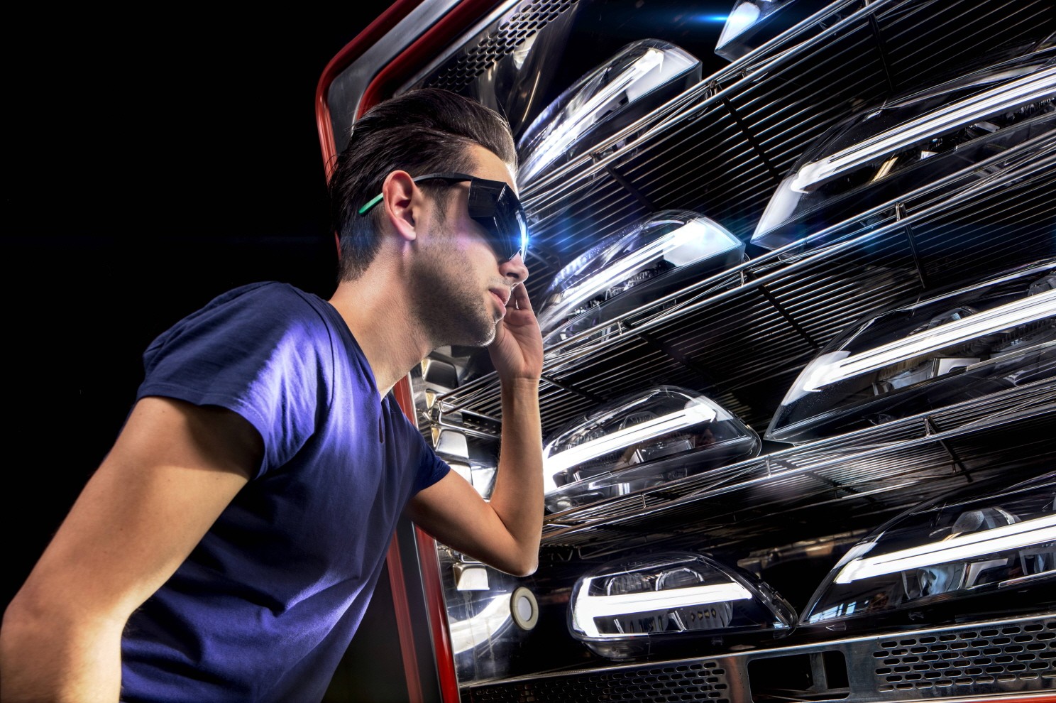 A model poses wearing VR goggles.