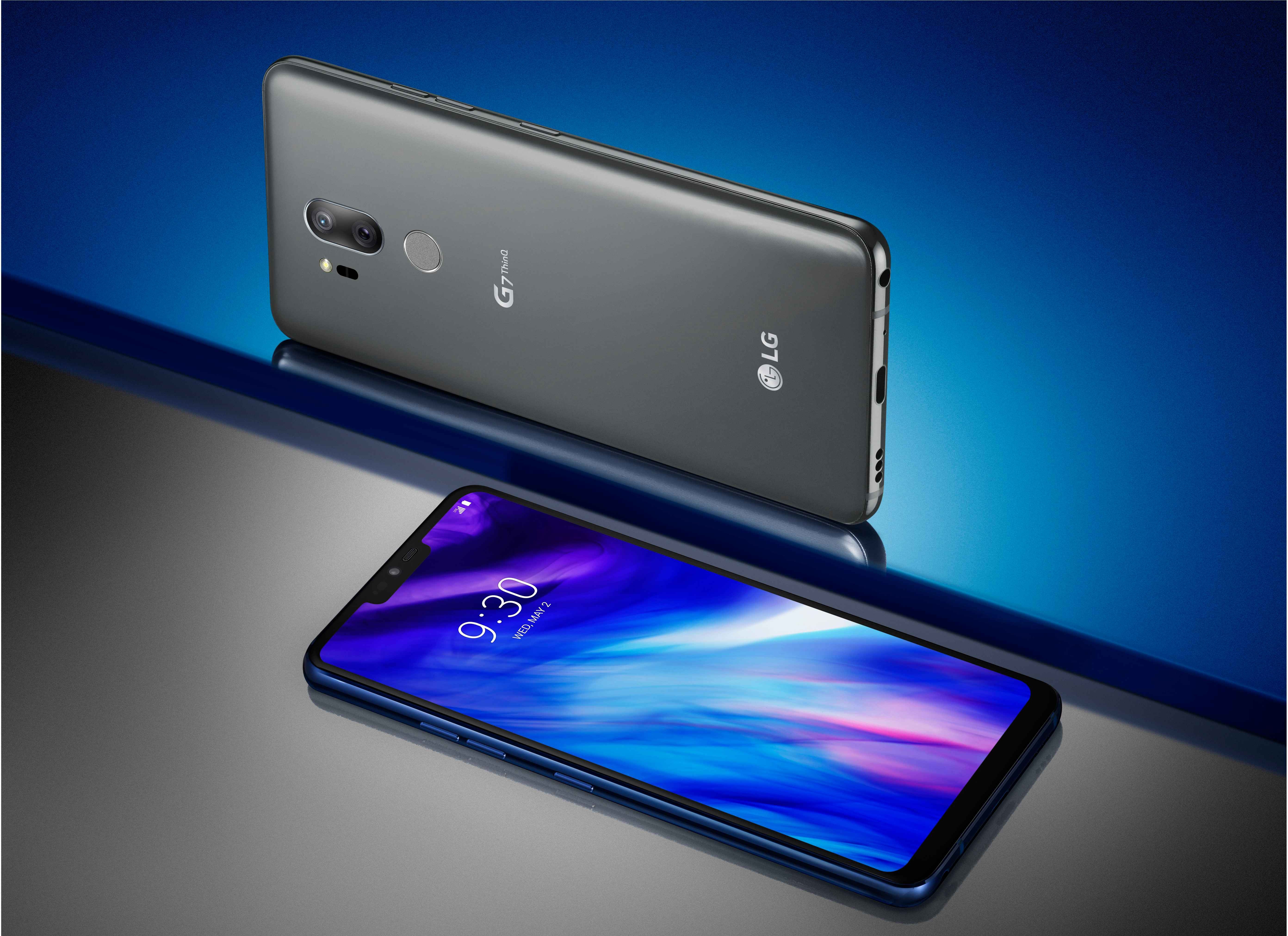 The front and rear view of the LG G7 ThinQ in New Platinum Gray against a gray and blue background