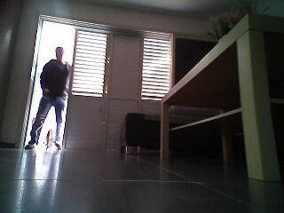 A screenshot of footage recorded by LG HOM-BOT robot vacuum cleaner shows the moment a thief breaks into the user’s home.