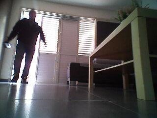 Another screenshot of footage recorded by LG HOM-BOT robot vacuum cleaner shows the moment a thief breaks into the user’s home.