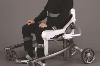 Side view of man seated on LG CLOi SuitBot