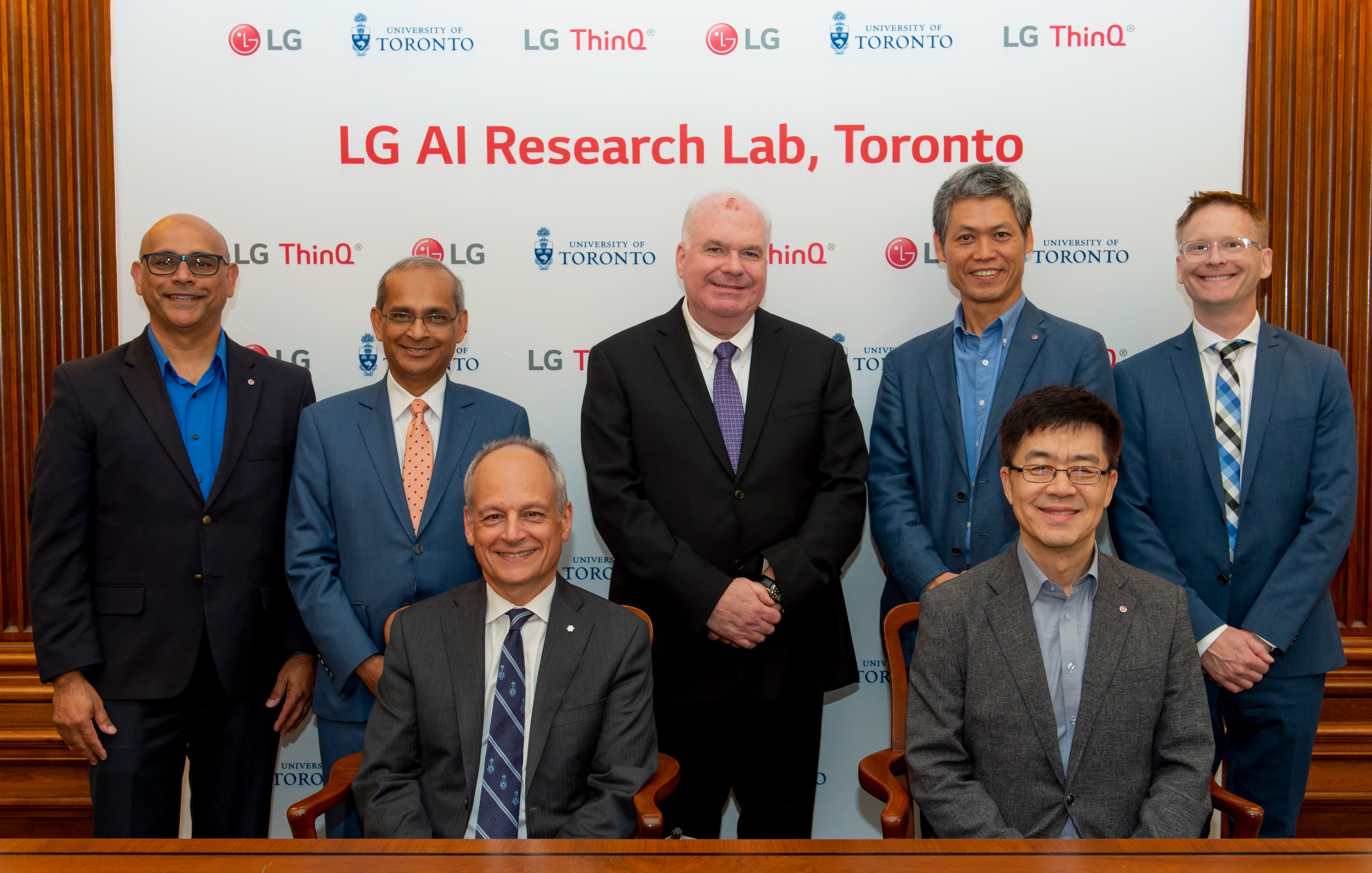 LG Electronics president and chief technology officer, Dr. I.P. Park, and University of Toronto president Meric Gertler, pose with delegates for a group picture.