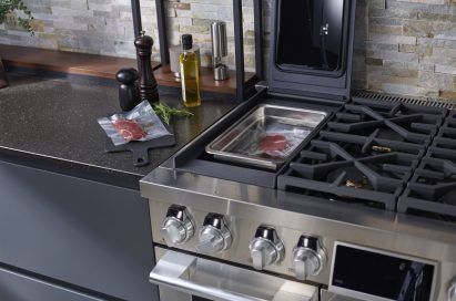 SIGNATURE KITCHEN SUITE oven induction cooktop with sous-vide section door open