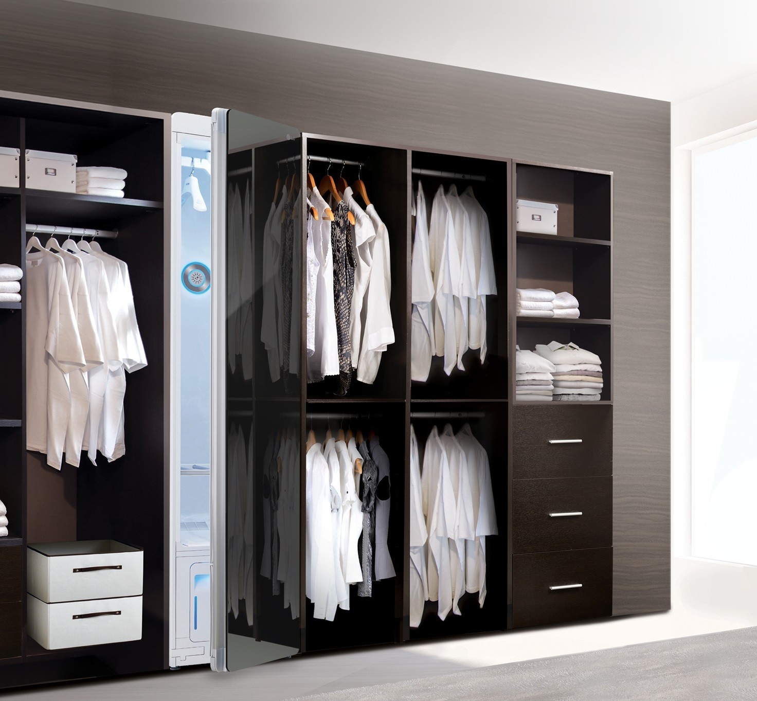 LG Styler with door slightly open inside a walk-in closet