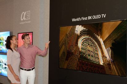 Two models admiring the world’s first LG 8K OLED TV at IFA 2018