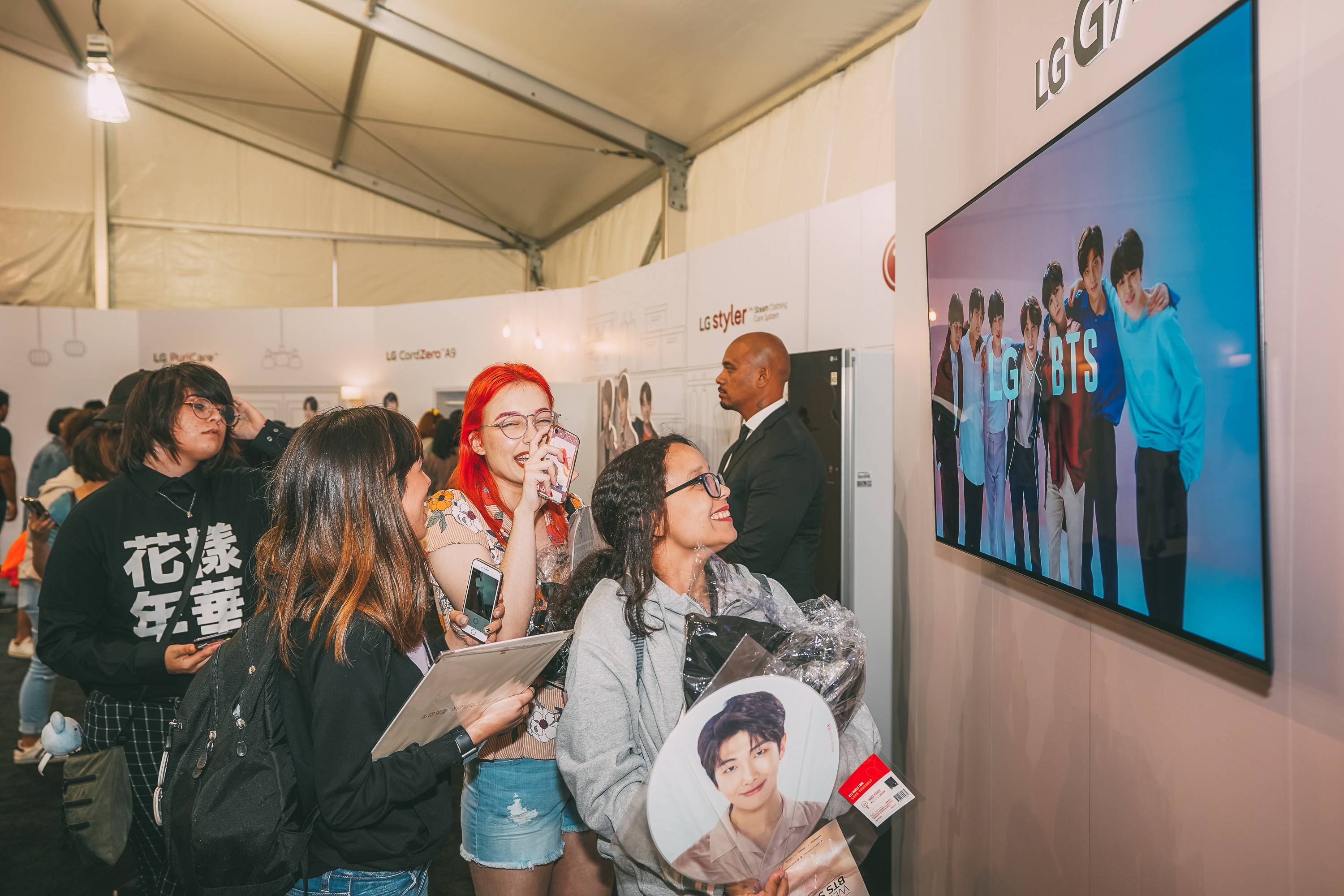BTS fans enjoy a BTS video at the BTS Studio Presented by LG.