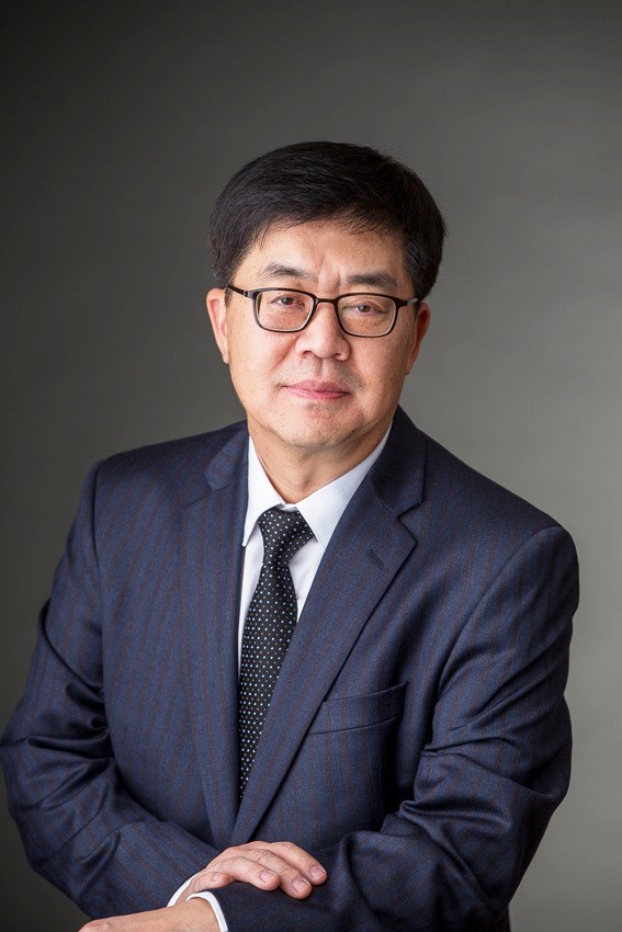 A headshot of president and chief technology officer of LG Electronics, Dr. I.P. Park.