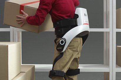 Close up of man lifting box while wearing the LG CLOi SuitBot