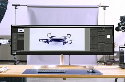LG UltraWide showing a larger picture taken by two directors on its expansive screen in a studio