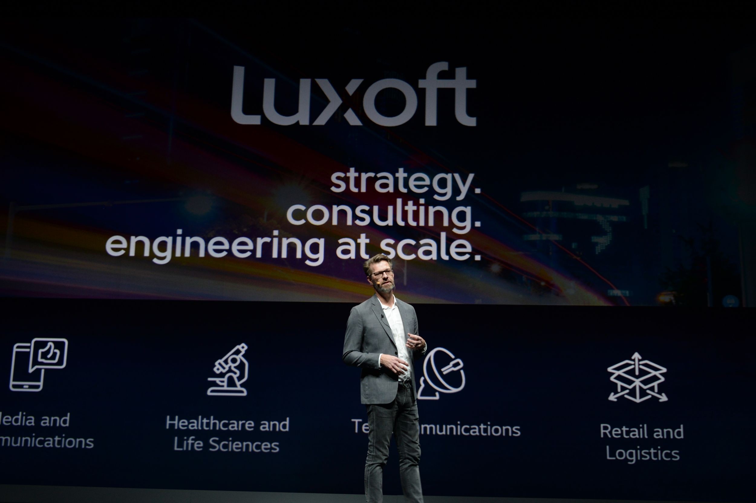 Mr. Alwin Bakkenes, managing director of automotive at Luxoft, delivers the keynote address.