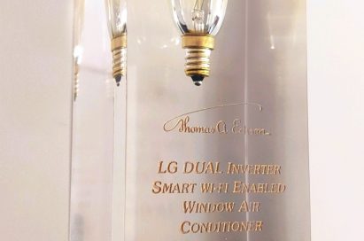 The trophy of the 2019 Gold Edison Award which is engraved with the product name of LG DUAL Inverter Smart Wi-Fi-enabled Window Air Conditioner