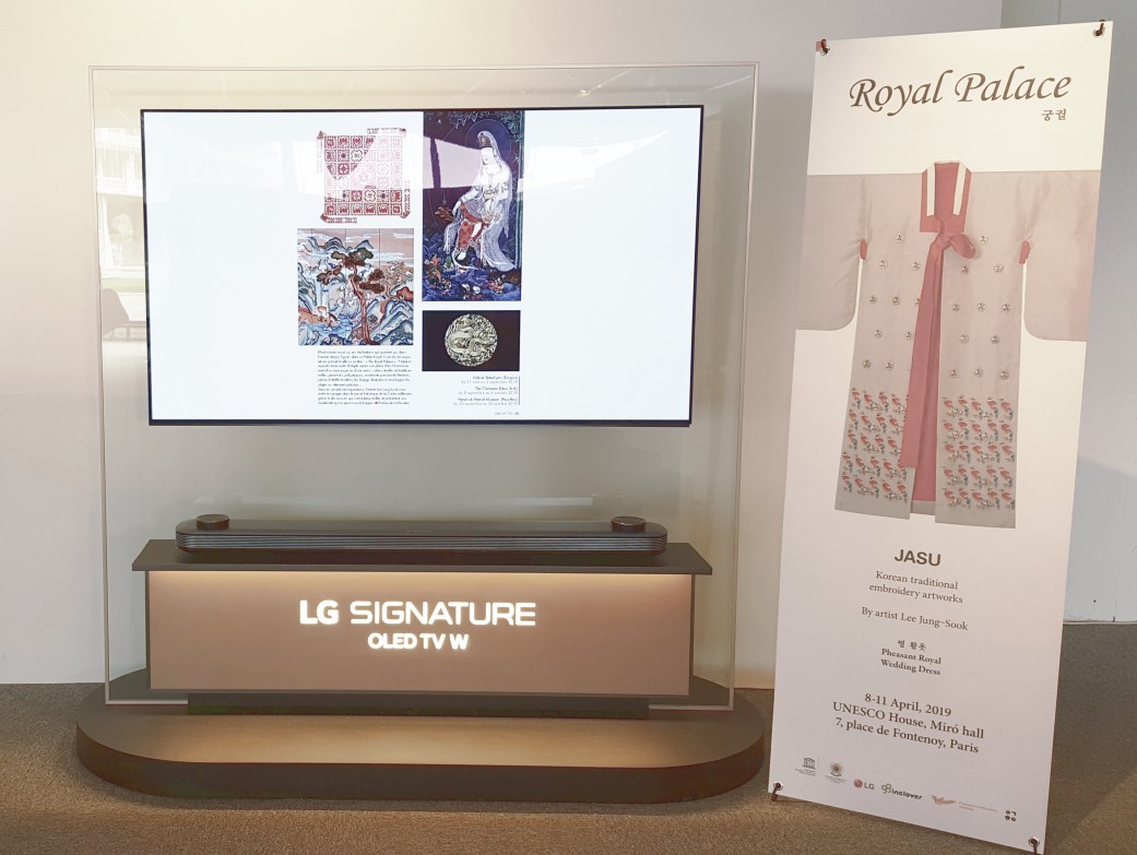 The LG SIGNATURE OLED TV W and promotional banner introduce Korea’s traditional “chasu” embroidery.