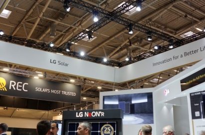 A group of visitors talk to each other at the entrance of LG’s booth at Intersolar Europe 2019