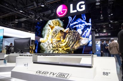 An LG 8K OLED TV showing a vivid image of kittens