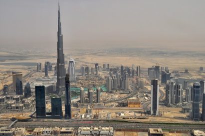 An upper view of Dubai with many buildings including Burj Khalifa, the world's tallest tower