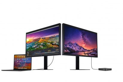 A right and left-side view of the LG UltraFine 5K, one connected to a laptop and the other connected to a device