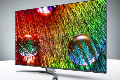A right-side view of LG 8K NanoCell TV model 75SM99 displaying a close-up picture of colorful water droplets