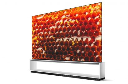 A right-side view of LG SIGNATURE OLED 8K TV model 88Z9 displaying a close-up picture of a honeycomb