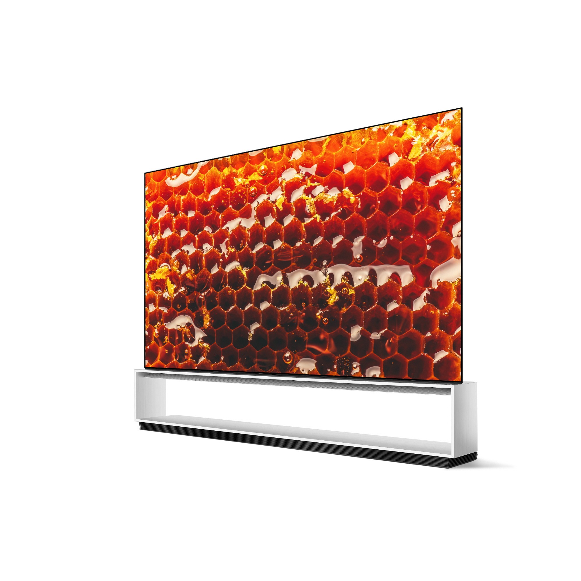 A right-side view of LG SIGNATURE OLED 8K TV model 88Z9 displaying a close-up picture of a honeycomb