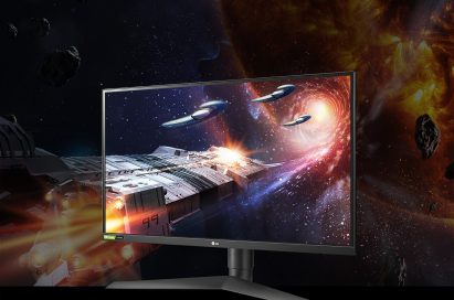A right-side view of the LG UltraGear Monitor model 27GN750 displaying life-like images of space with rich colors in a dark setting