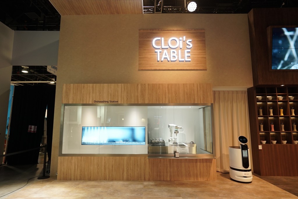 A front view of the ‘CLOi’s Table’ restaurant set up for CES 2020, with LG’s advanced robots from its CLOi lineup on display to visitors