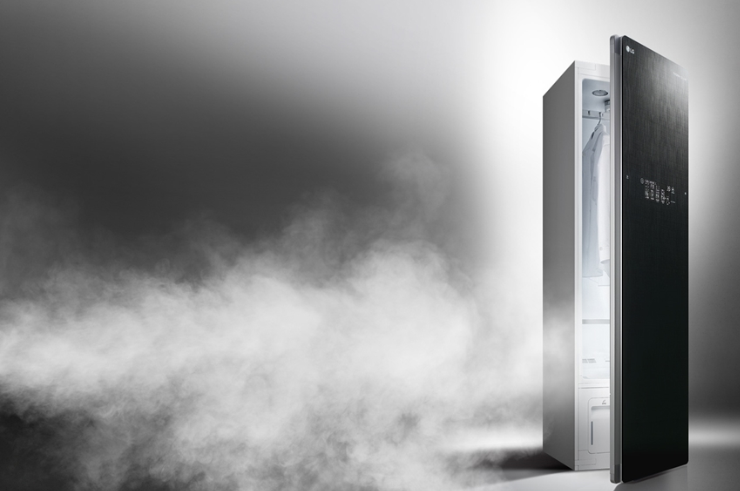 A promotional image of the LG Styler with its door slightly open and lots of steam escaping from inside
