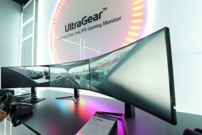 A closer look at three UltraGear monitors being used side-by-side to create one ultra-wide display to play a racing game at LG’s CES 2020 booth
