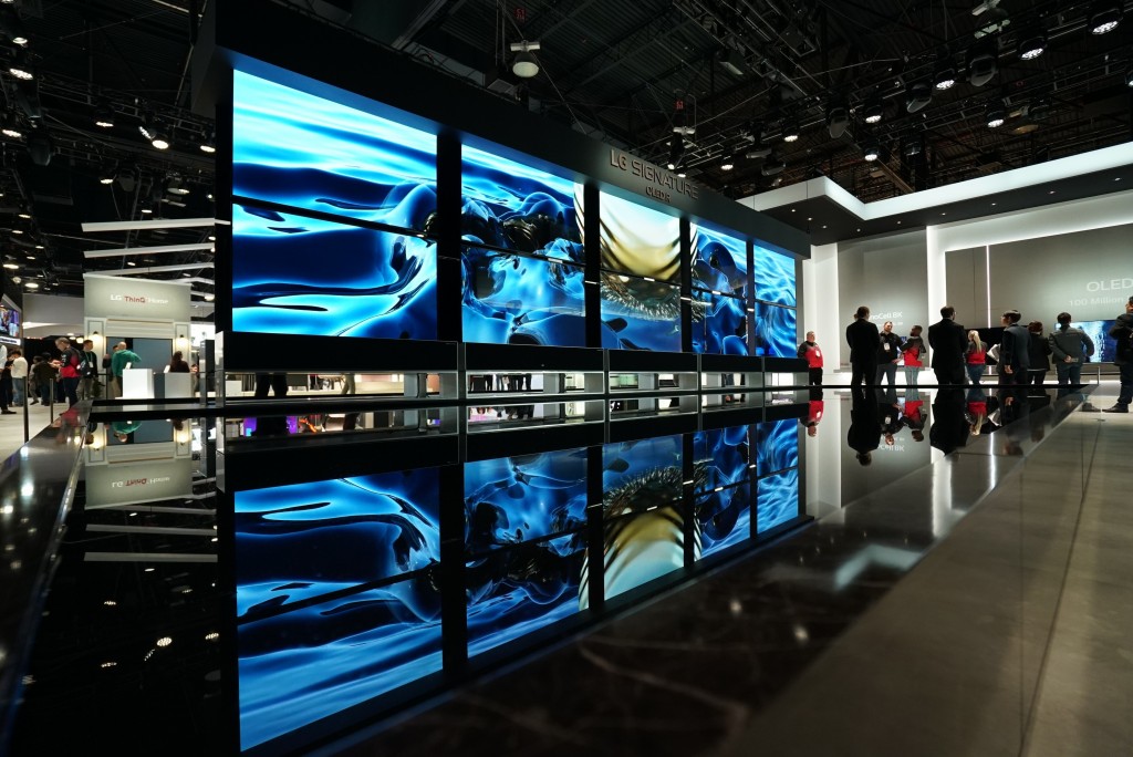 Ten LG SIGNATURE OLED R TVs, five hanging upside down, create an awe-inspiring display at the company’s CES 2020 booth