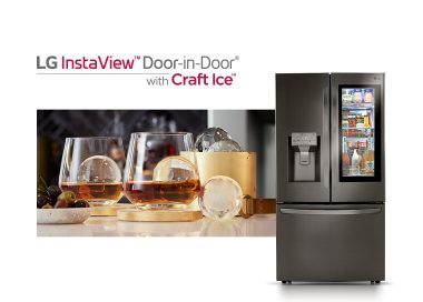 Front view of LG InstaView™ Door-in-Door® showing its inside through the InstaView becoming transparent with a close-up view of multiple glasses of whiskey on the rock made using Craft Ice™ placed on a table