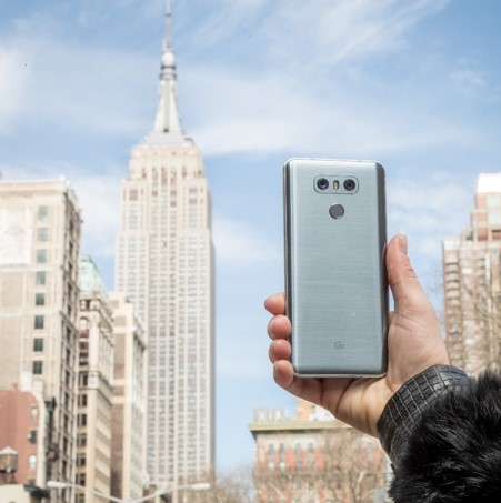 A man holds out LG's