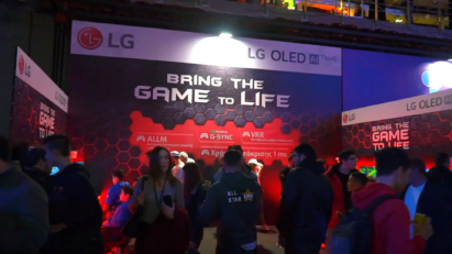 The LG OLED AI ThinQ booth at Gameathlon 2020 displaying the 'Bring the Game to Life' slogan as numerous attendees check out LG's latest TVs and monitors
