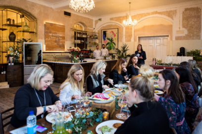 The Cellar Door event’s guests having a meal and drinking wine together in the Old Sessions House