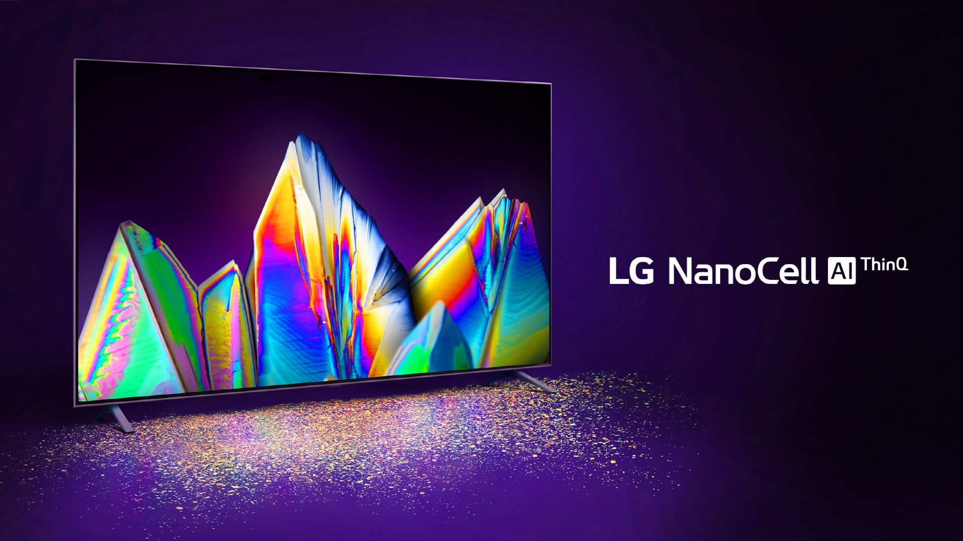 Front view of LG NanoCell TV model Nano99 displaying a wide range of vivid colors in the dark, with the LG NanoCell AI ThinQ logo on the right
