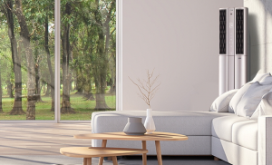 A shot of LG’s Air Conditioner placed behind the sofa of a modern, open-space living room