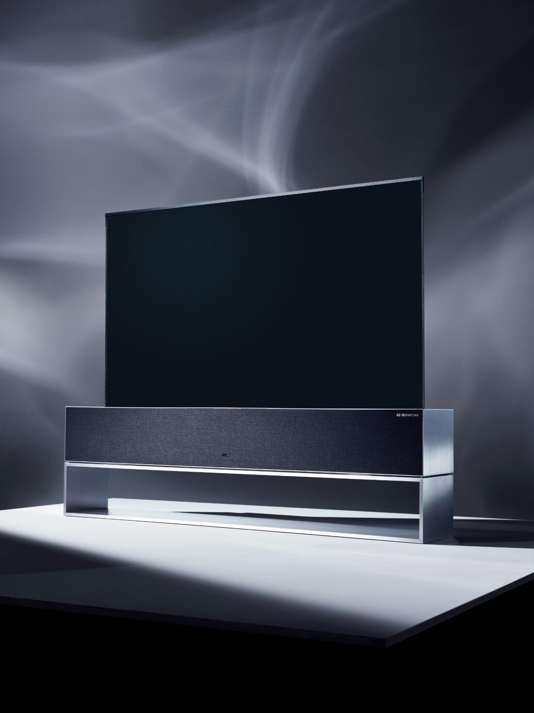 Concept image of the front LG SIGNATURE OLED TV R facing 10 degrees to the left at a darkened studio