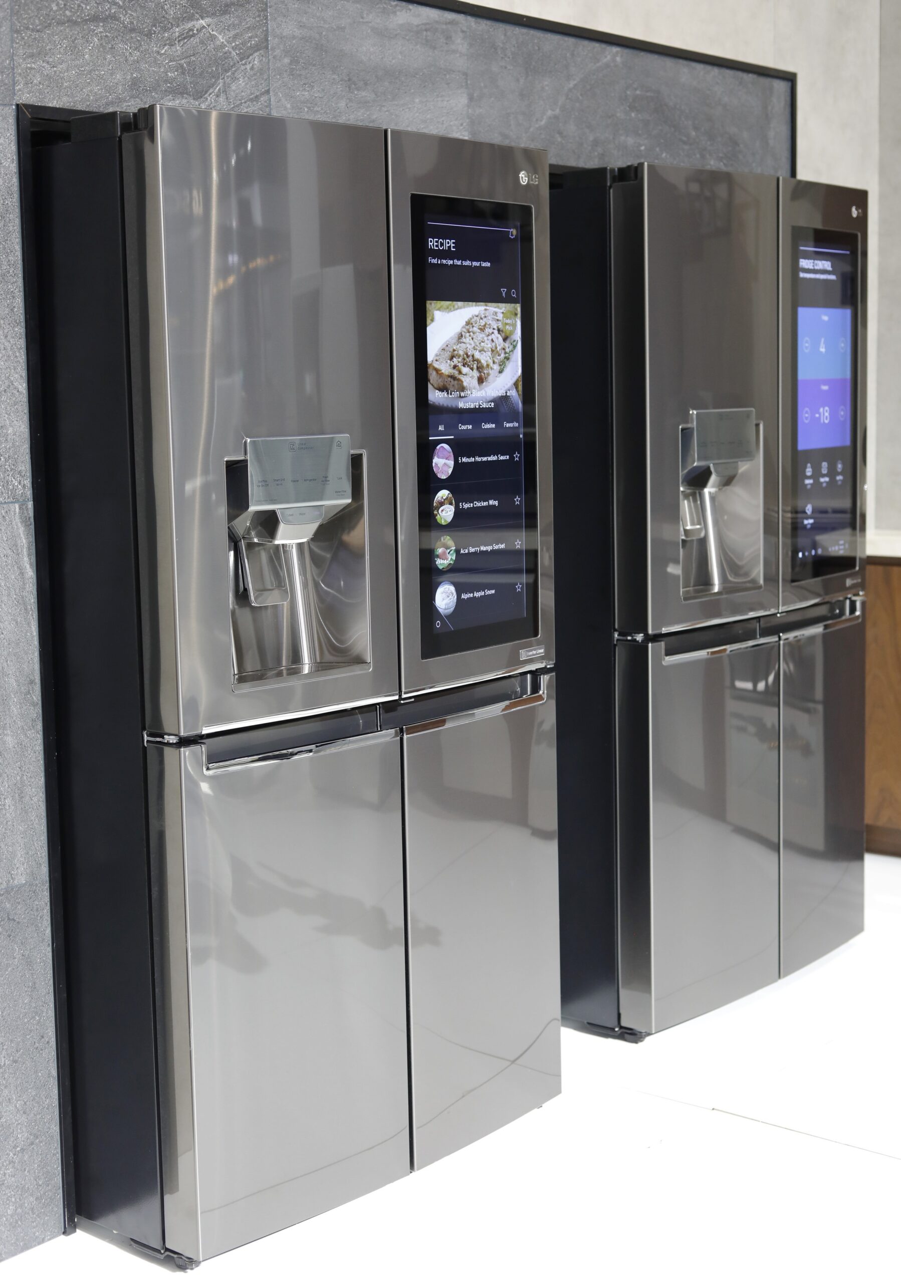 Two LG InstaView Door-in-Door refrigerators in the LG display zone at CES 2017