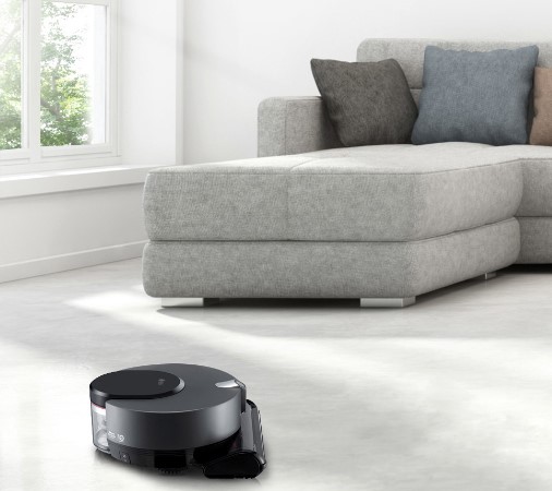 LG CordZeroThinQ vacuuming the living room carpet via the ThinQ™ app