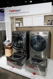 Two LG TwinWash washing machines with the SideKick feature are on display at LG's CES 2017 booth.
