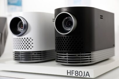 Close-up view of two LG ProBeam HF80JA home projectors on display at LG's CES 2017 booth