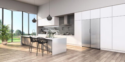 A whole view of a modern kitchen featuring LG Fridge and Freezer pair
