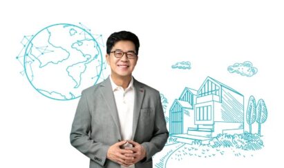 LG’s president & CTO Dr. I.P. Park standing in front of an illustration of the LG ThinQ Home