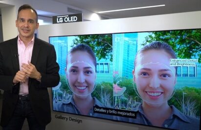 Luis Gálvez of LG stands in front of a newly launched LG OLED TV as he talks about its enhanced detail and brightness