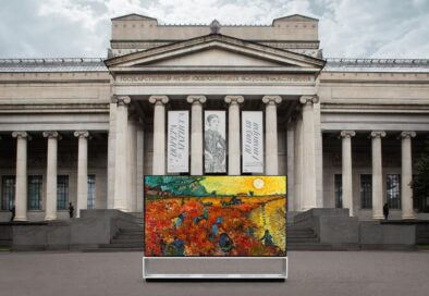 LG SIGNATURE OLED 8K TV displaying a painting in front of the majestic Pushkin Museum building
