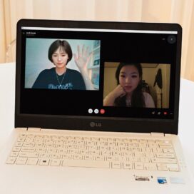 Reah Keem video chatting with a fan on an LG laptop.