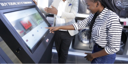 A customer browsing products on a screen at Africa's first-ever digital showroom.