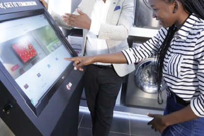 A customer browsing products on a screen at Africa's first-ever digital showroom.