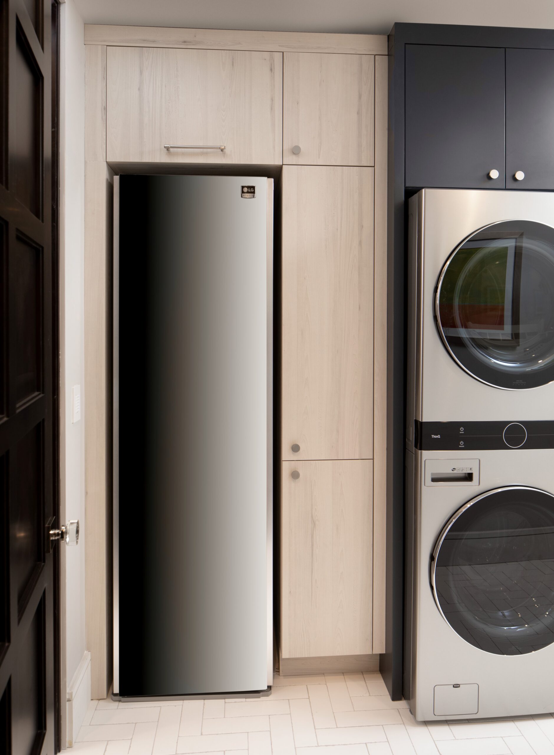 LG Styler and LG WashTower which keep clothes immaculate giving the showroom's utility room a touch of class.