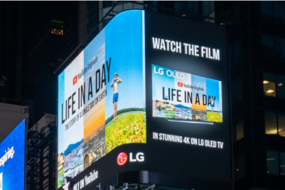 LG's enormous high-definition digital billboard in Time Square, New York, playing the YouTube Originals documentary 'Life in a Day.'