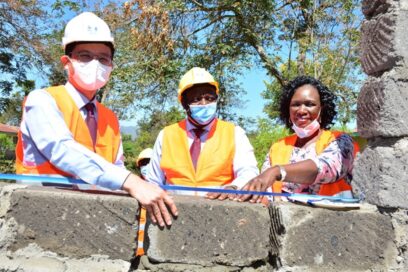 Kim Sa-nyoung, LGE's managing director for East and Central Africa, joins deputy governor of Machakos County, Eng. Francis Maliti, and national director of Habitat for Humanity Kenya, Ruth Odera, at the construction site of Machakos School for the Deaf's new library.