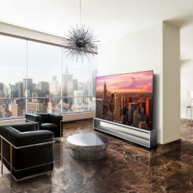 Earth meets metal in this luxurious living space, fusing the unique, high-end characteristics of the Marron Emperador marble floor with the cool steel of the OLED TV's Art Furniture Stand. The 8K resolution of the OLED TV blended with the natural elements of the smooth marble floor giving out the perfect juxtaposition to LG SIGNATURE's technology, offering a superior viewing experience.